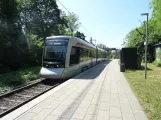 Aarhus light rail line L1 with low-floor articulated tram 2104-2204 at Hovmarken (2023)