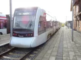 Aarhus light rail line L1 with low-floor articulated tram 2103-2203 at Hornslet (2020)