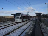 Aarhus light rail line L2 with low-floor articulated tram 1103-1203 at Humlehuse (2021)