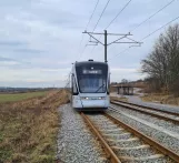 Aarhus light rail line L2 with low-floor articulated tram 1103-1203 near Lisbjerg-Terp (2021)