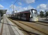 Aarhus light rail line L2 with low-floor articulated tram 1104-1204 at Skolebakken (2023)