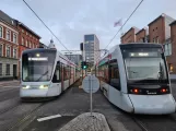 Aarhus light rail line L2 with low-floor articulated tram 1110-1210 in the intersection Nørreport/Mejlgade (2020)