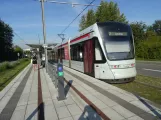 Aarhus light rail line L2 with low-floor articulated tram 1112-1212 at Olof Palmes Alle (2023)