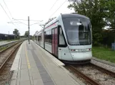Aarhus light rail line L2 with low-floor articulated tram 1112-1212 at Tranbjerg (2023)