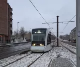 Aarhus light rail line L2 with low-floor articulated tram 2102-2202, the front Nørrebrogade (2021)