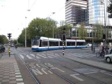 Amsterdam tram line 4 with low-floor articulated tram 2082 in the intersection Frederiksplein/Westeinde (2009)