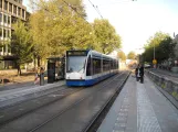 Amsterdam tram line 4 with low-floor articulated tram 2150 on Frederiksplein (2009)