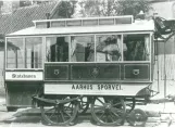 Archive photo: Aarhus horse tram 5 inside Scandia's gård, seen from the side (1884)