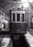 Archive photo: Malmö track cleaning tram 105 inside the depot Elspårvagnshallarna front view (1973)