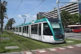 Barcelona tram line T3 with low-floor articulated tram 07 on Maria Cristina Avinguda Diagonal (2012)