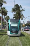 Barcelona tram line T3 with low-floor articulated tram 07 on Maria Cristina Avinguda Diagonal, front view (2012)
