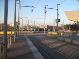 Barcelona tram line T4 with low-floor articulated tram 03 on Places de les Glories Catalenes (2015)