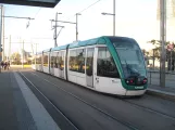 Barcelona tram line T4 with low-floor articulated tram 14 at Ca l'Aranyó (2015)