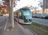 Barcelona tram line T4 with low-floor articulated tram 16 on Avinguda Diagonal (2015)