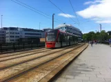 Bergen tram line 1 (Bybanen) with low-floor articulated tram 213 on Nygårdsgaten (2012)