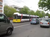 Berlin fast line M1 with low-floor articulated tram 1513 on Grabbeallè, Pankow (2016)