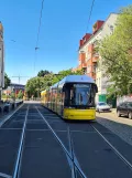 Berlin fast line M13 with low-floor articulated tram 9120 at S+U Warschauer Straße (2022)