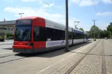 Bremen tram line 1 with low-floor articulated tram 3103 at Huchting Roland-Center (2013)