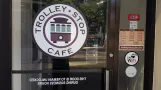 Dallas outside Trolley Stop Café (2018)