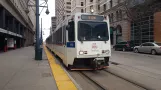 Denver tram line D with articulated tram 338 on Stout Street (2020)