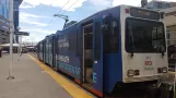 Denver tram line E with articulated tram 241 at Union Station (2020)