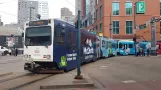 Denver tram line H with articulated tram 211 on Stout Street (2020)