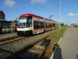 Gdańsk tram line 8 with low-floor articulated tram 1043 "Marian Seredyński" at Chmielna (2024)