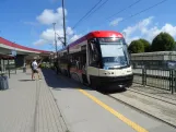 Gdańsk tram line 9 with low-floor articulated tram 1011 "Daniel Gralath" at Brama Żuławska (2024)