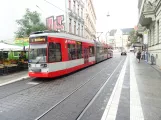 Halle (Saale) tram line 1 with low-floor articulated tram 606 at Joliot-Curie-Platz (2023)
