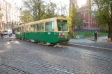 Helsinki tram line 10 with articulated tram 70 at Johanneksenpuisto/Johanneksenkirkko seen from behind (2011)