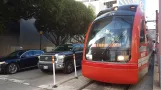 Houston tram line Red with low-floor articulated tram 111 at Dryden/TMC (2018)