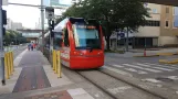 Houston tram line Red with low-floor articulated tram 213 at Memorial Hermann Hospital/Houston Zoo (2018)