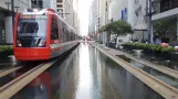 Houston tram line Red with low-floor articulated tram 308 on Main Street (2018)