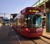 Innsbruck Stubaitalbahn (STB) with low-floor articulated tram 326 at Hauptbahnhof, Südtiroler Platz  seen from behind (2020)
