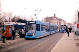 Kassel tram line 5 with low-floor articulated tram 454 at Auestadion (1998)