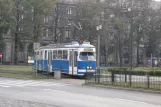 Kraków extra line 17 with articulated tram 164 on plac Centralny Imienia Ronalda Reagana (2011)
