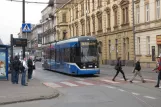 Kraków fast line 50 with low-floor articulated tram 2039 at Miodowa (2011)