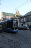 Kraków tram line 8 with low-floor articulated tram 2046 on Dominikańska (2011)