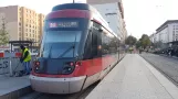 Lyon Rhônexpress with low-floor articulated tram 106 at Gare Part-Dieu Villette (2018)