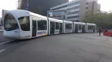 Lyon tram line T1 with low-floor articulated tram 48 in the intersection Rue Servient/Boulevard Marius Vivier Merle (2018)