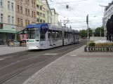 Magdeburg tram line 4 with low-floor articulated tram 1358 on Ernst-Rouler-Allee (2023)
