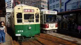 Nagasaki tram line 3 with railcar 373 at Nagasaki Eki-Mao (2017)