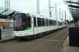 Nantes tram line 2 with low-floor articulated tram 322 at Le Cardo (2010)