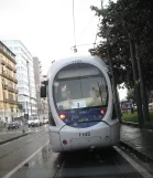 Naples tram line 1 with low-floor articulated tram 1103 in the intersection Via Amerigo Vecpucci/Corso Giuseppe Garibaldi (2014)