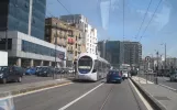 Naples tram line 4 with low-floor articulated tram 1102 on Via Nuova Marina (2014)