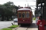 New Orleans line 47 Canal Streetcar with railcar 2013 at Canal at Carrollton (2010)