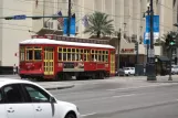 New Orleans line 47 Canal Streetcar with railcar 2019 on Canal street (2010)