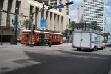 New Orleans line 47 Canal Streetcar with railcar 2023 in the intersection Canal street/Camp street (2010)