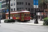 New Orleans line 47 Canal Streetcar with railcar 2023 on Canal street (2010)