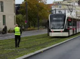 Odense low-floor articulated tram 08 "Eventyret" at Odense Å (2023)